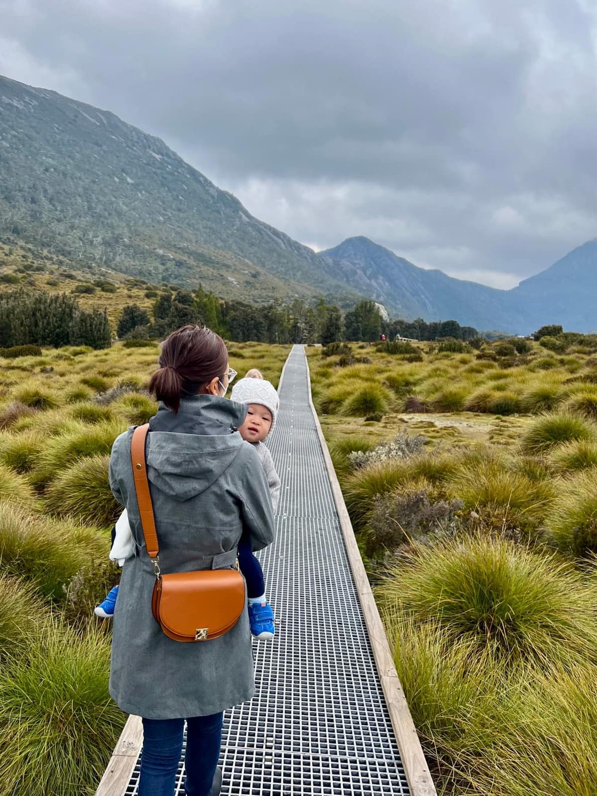 Vanessa walking a Cradle Valley trail while carrying George