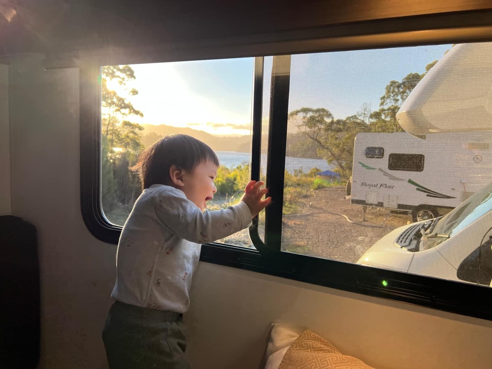 George looking out from the camper van