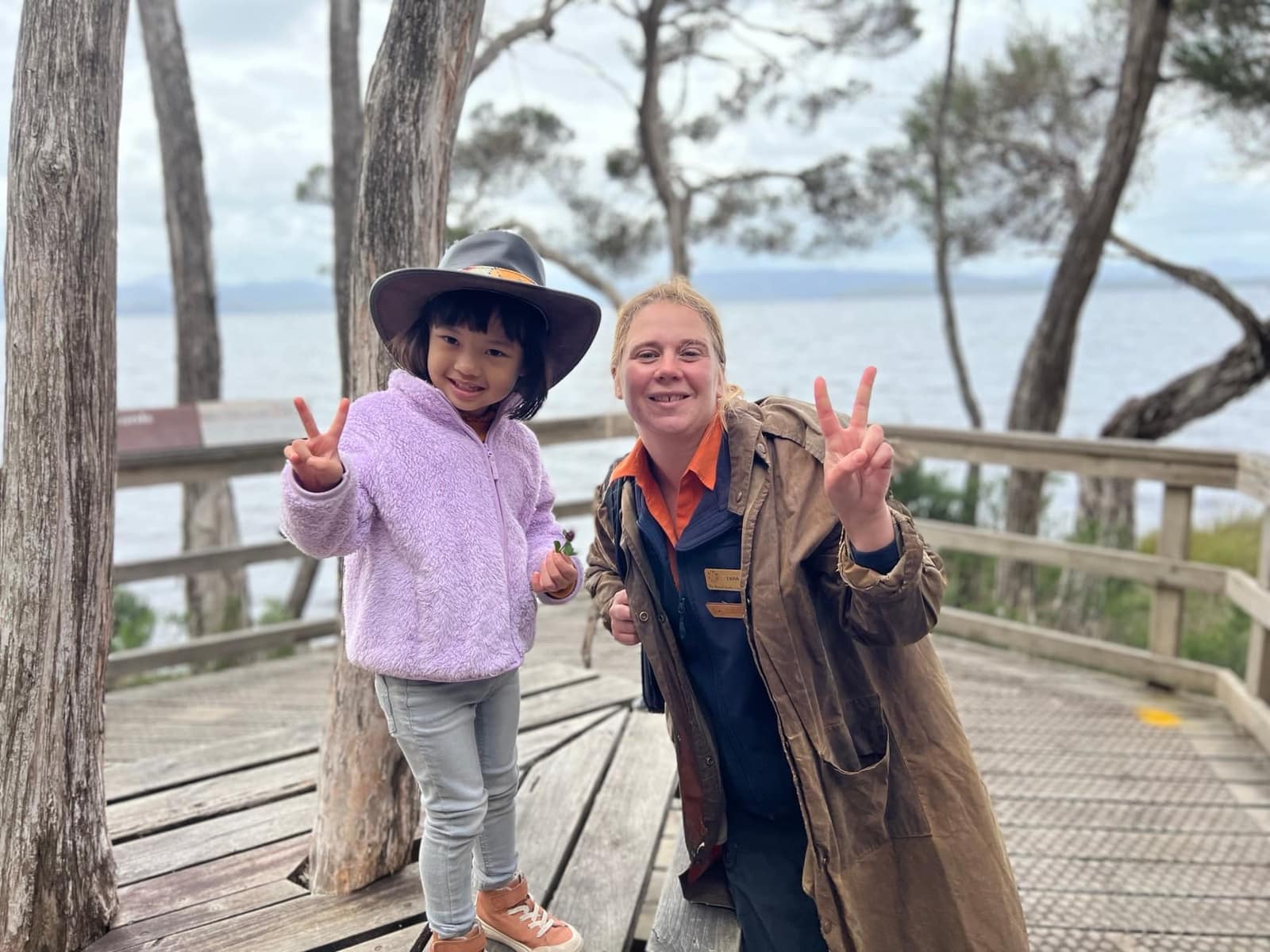 Sophie posing with a ranger on the Gordon River cruise