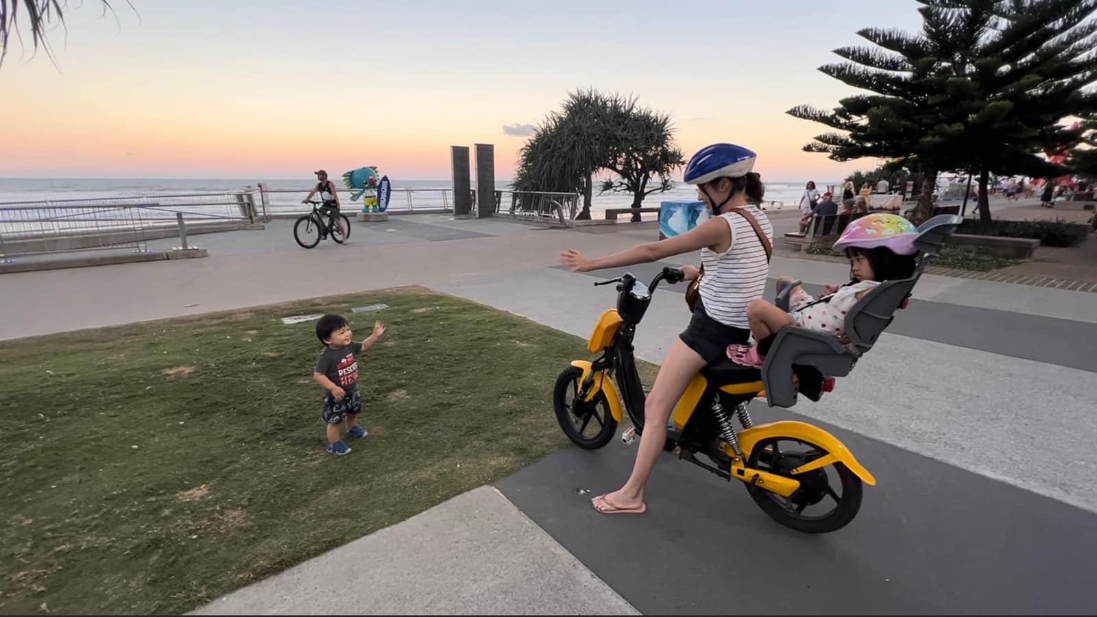 Family cycling in Brisbane during COVID recovery
