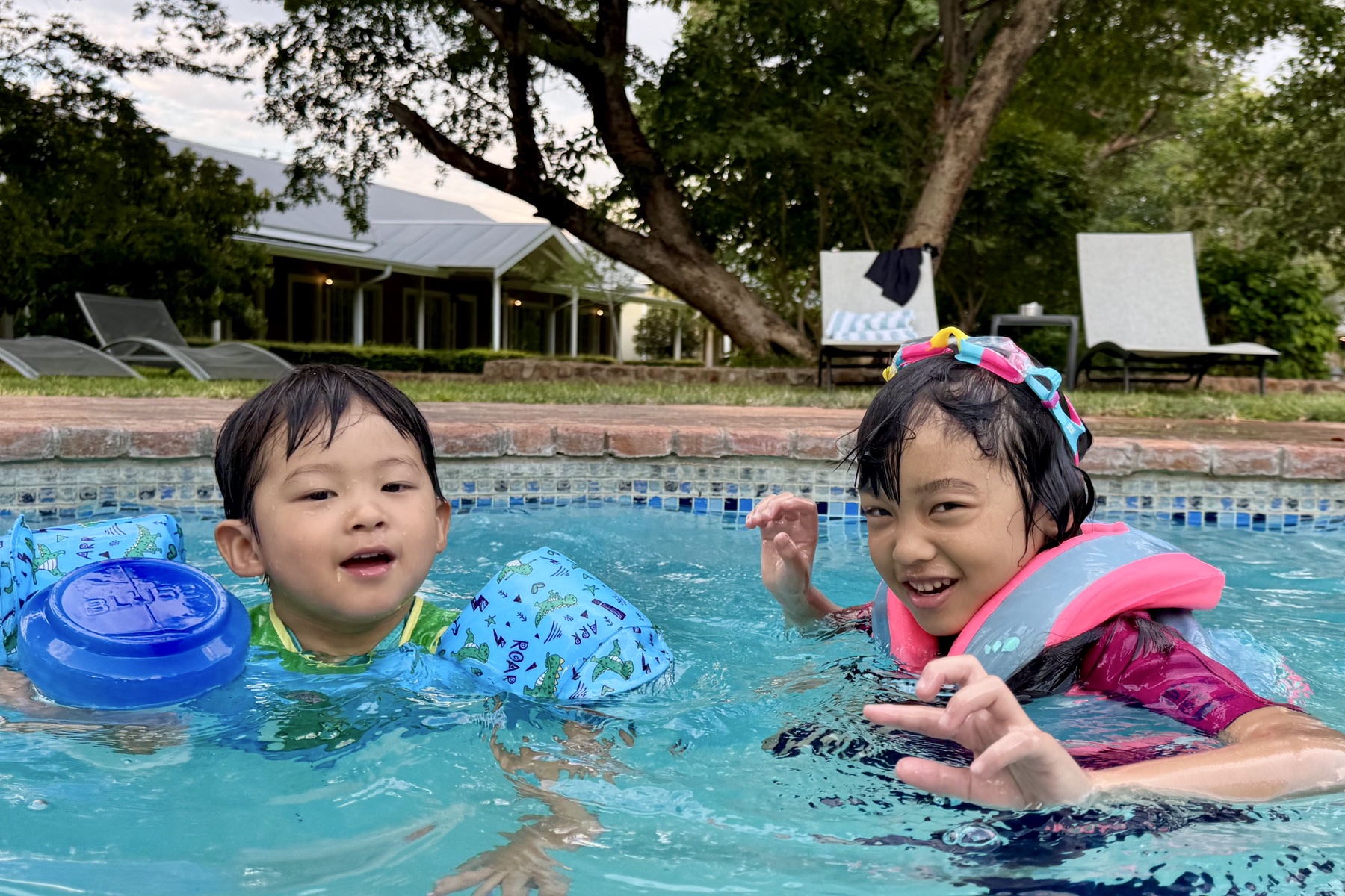 The children enjoying the pool
