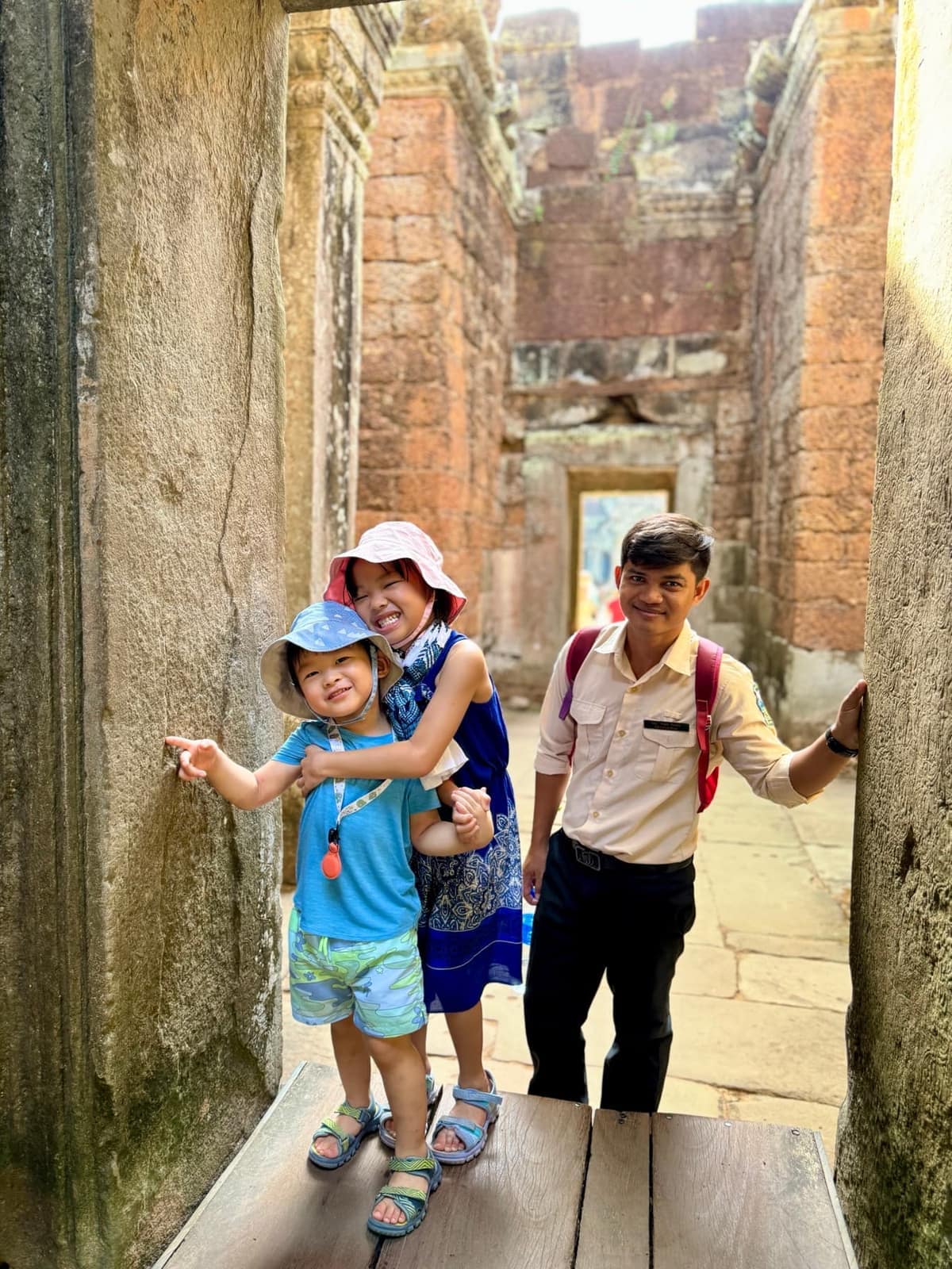 Sophie and George together with the family’s guide among the Angkor temples