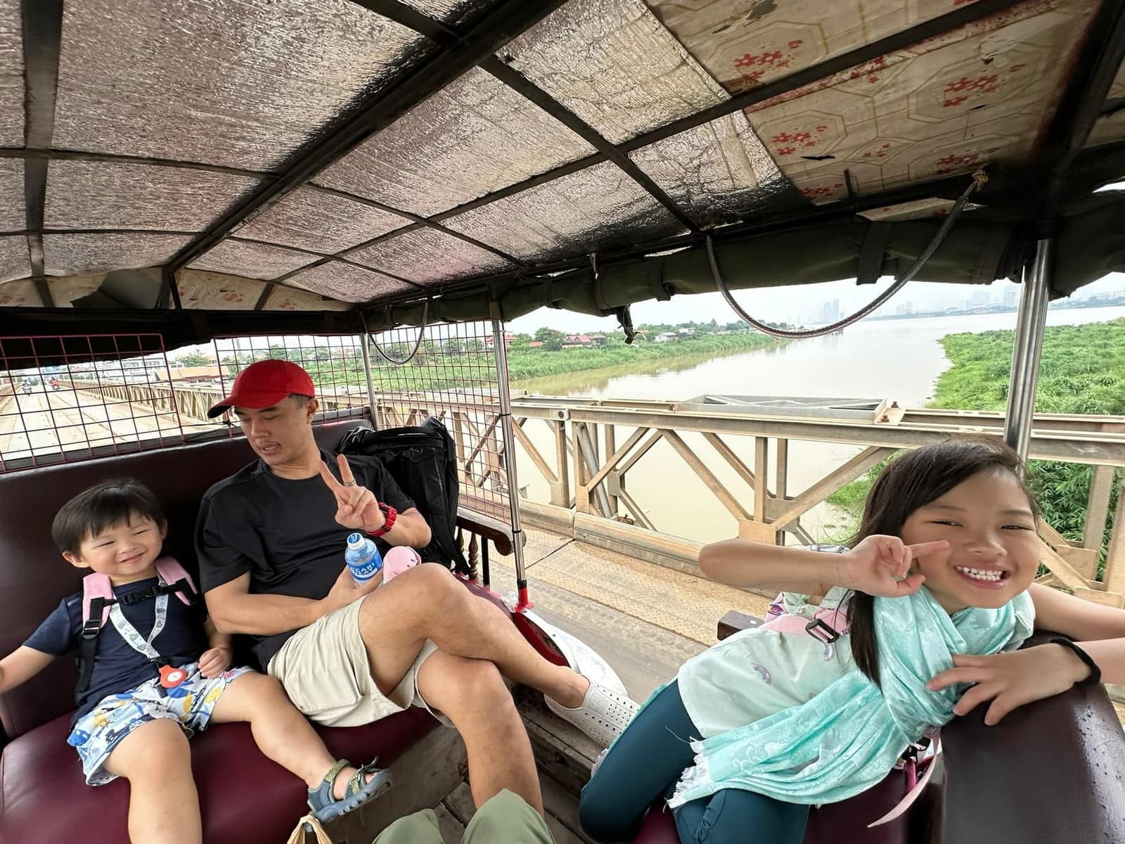 Philip, Sophie and George riding by tuk-tuk towards the Koh Dach ferry