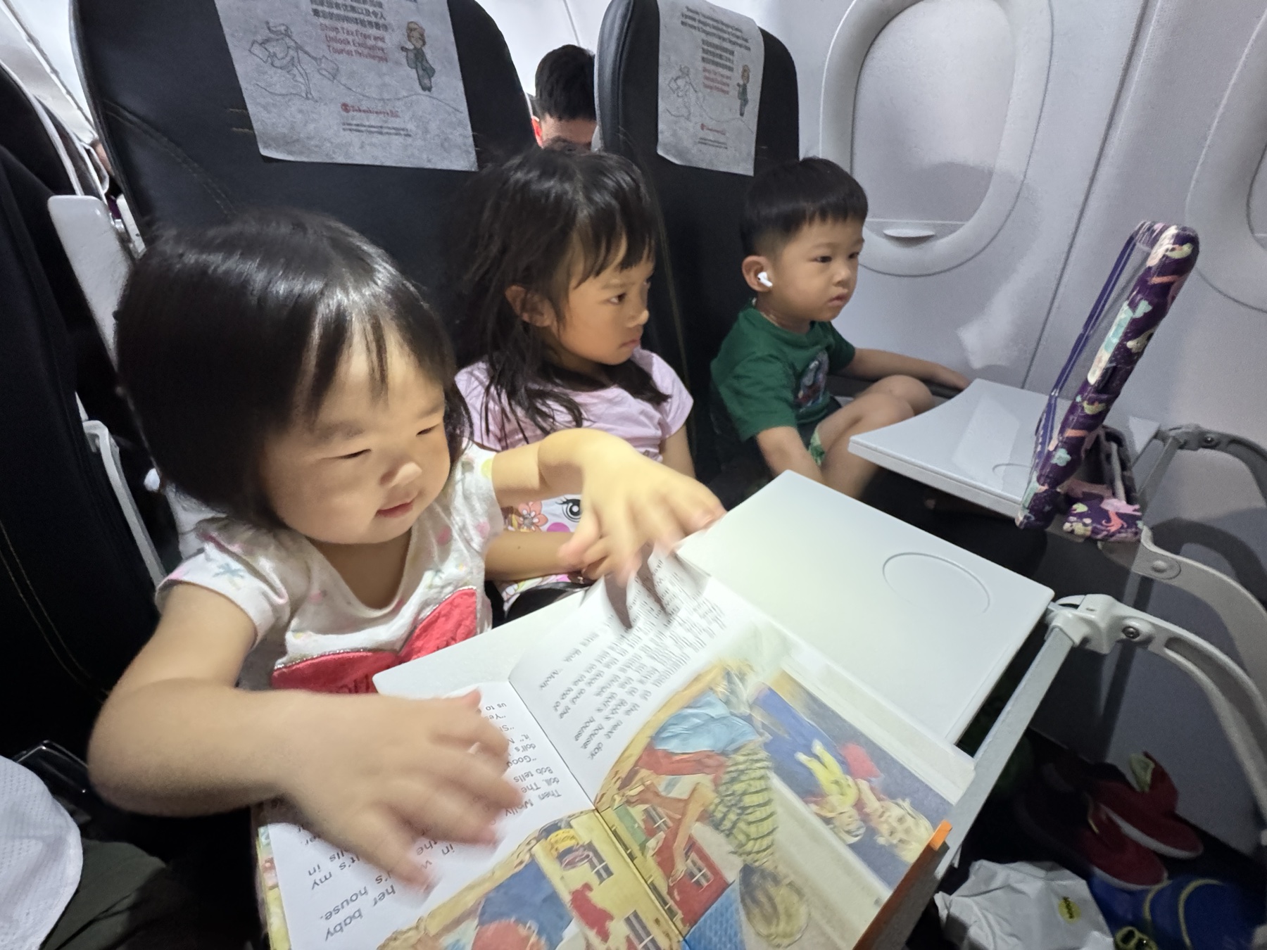 Claire, Sophie and George together on the flight to Cebu