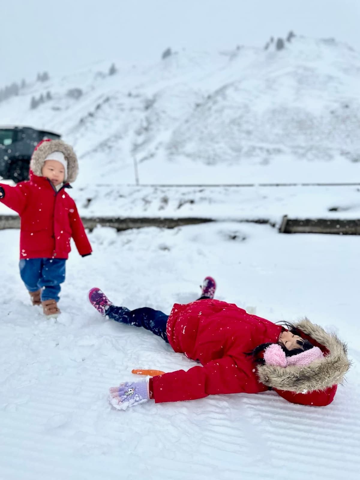 The children playing in snow for the first time