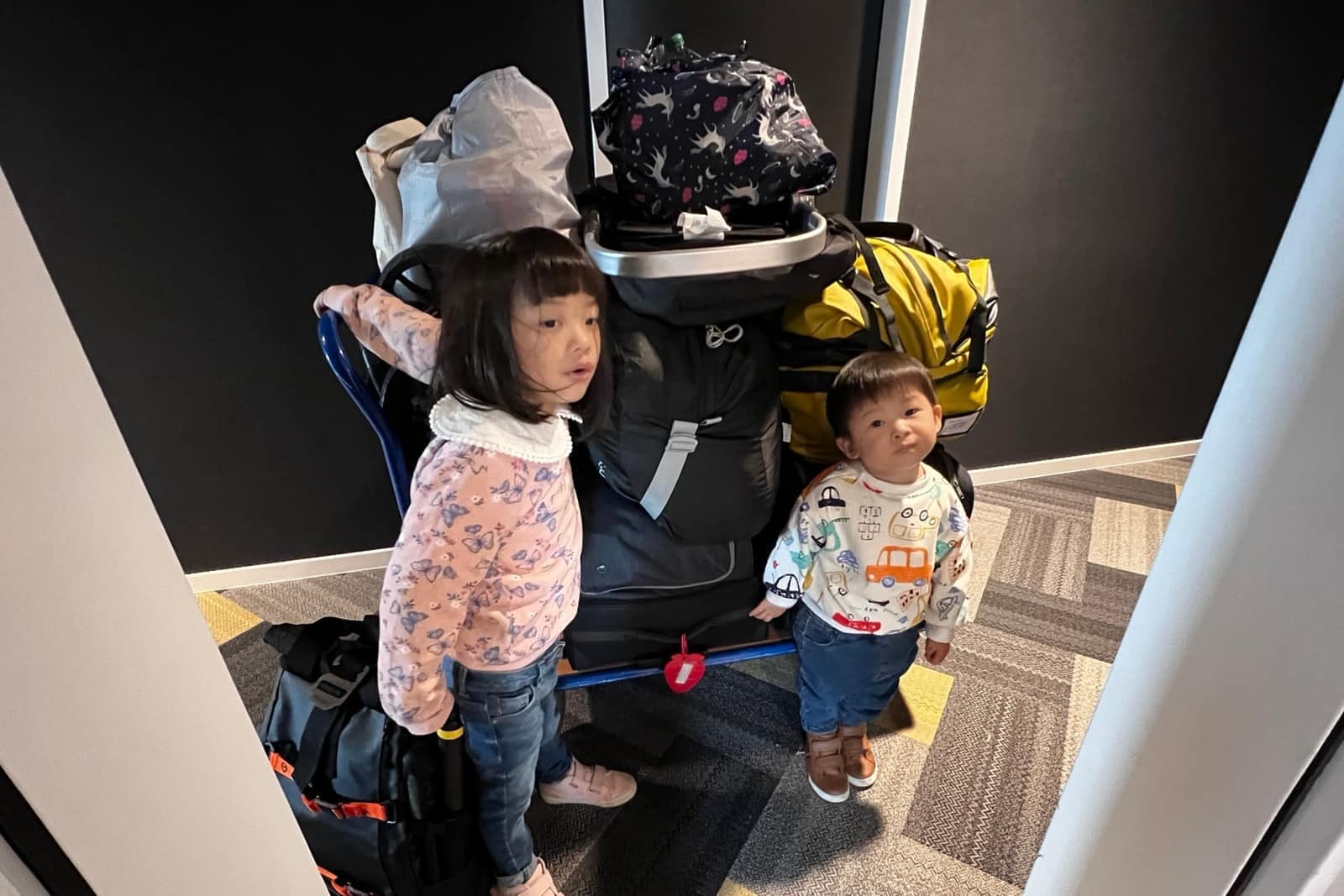The family loading luggage into the motorhome