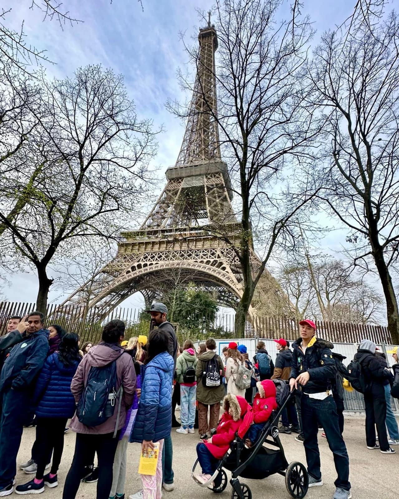 The family by the Eiffel Tower in Paris