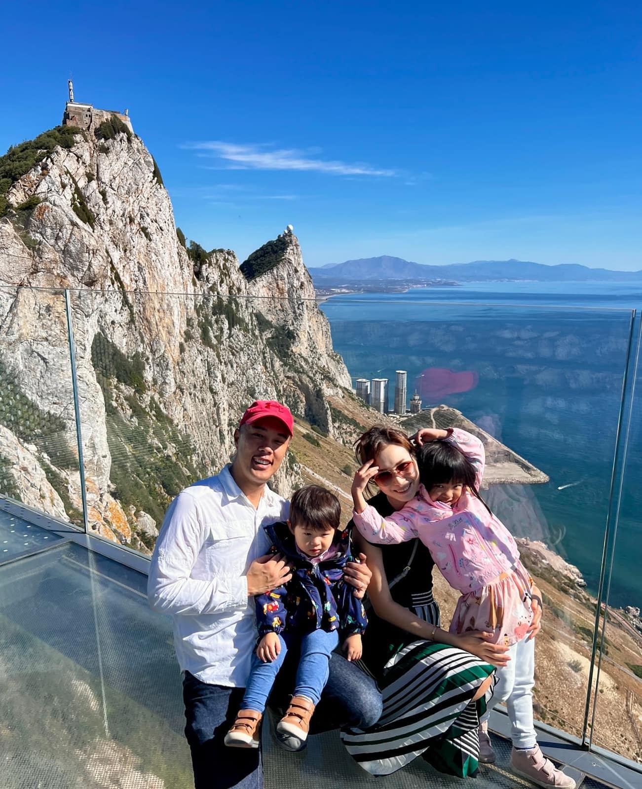 The family with the Rock of Gibraltar behind them
