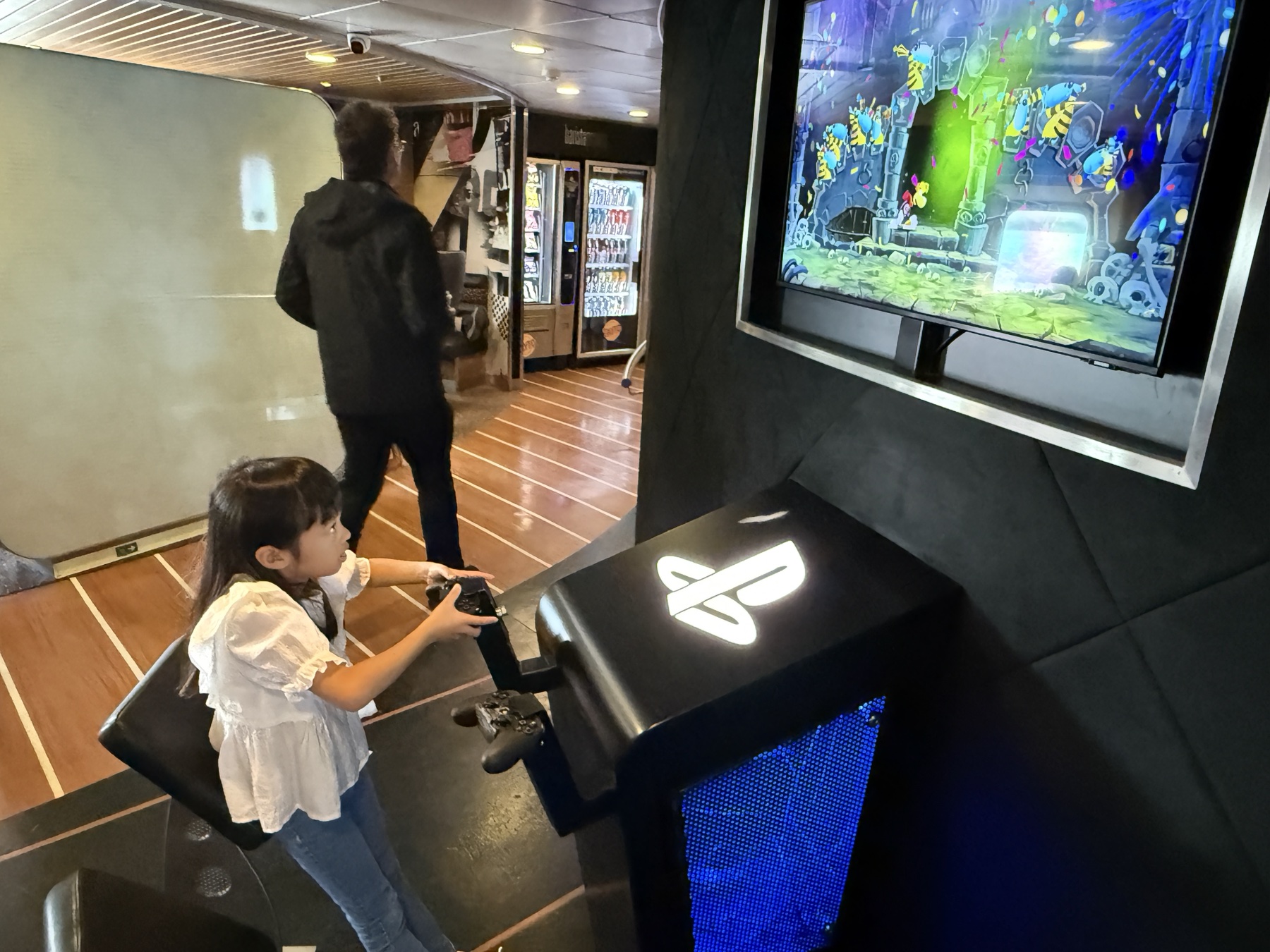 Sophie playing a computer game on the ferry to Ireland