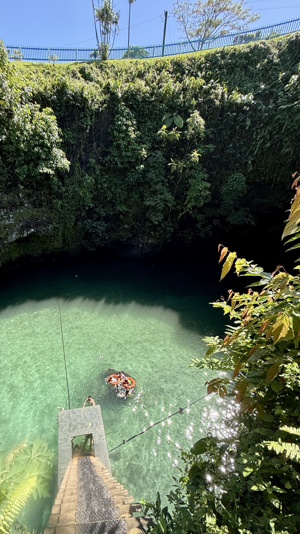 Vanessa and the children in To-Sua Ocean Trench, Samoa