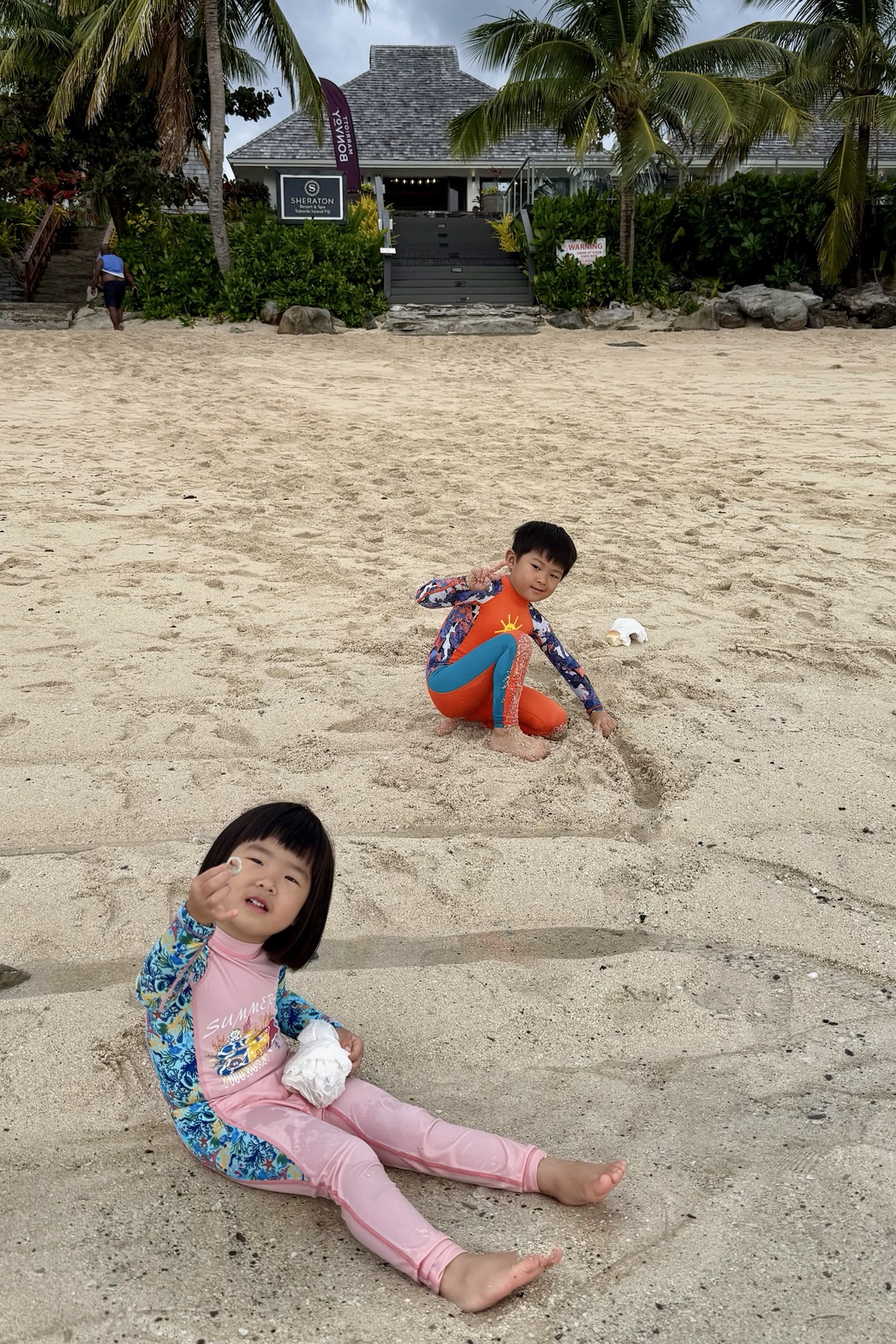 Children playing on the beach in Fiji