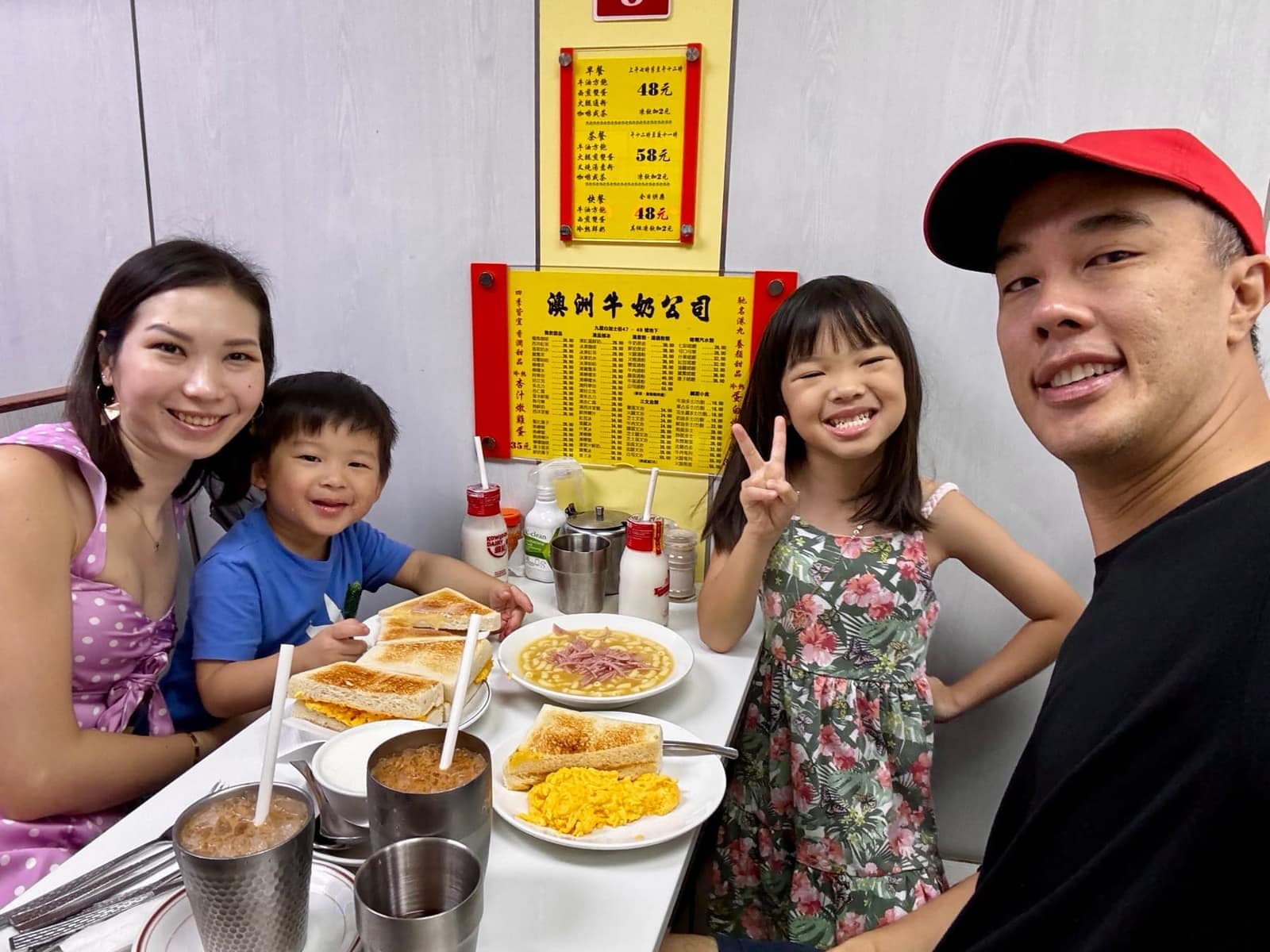 The family eating together at Australia Dairy Company