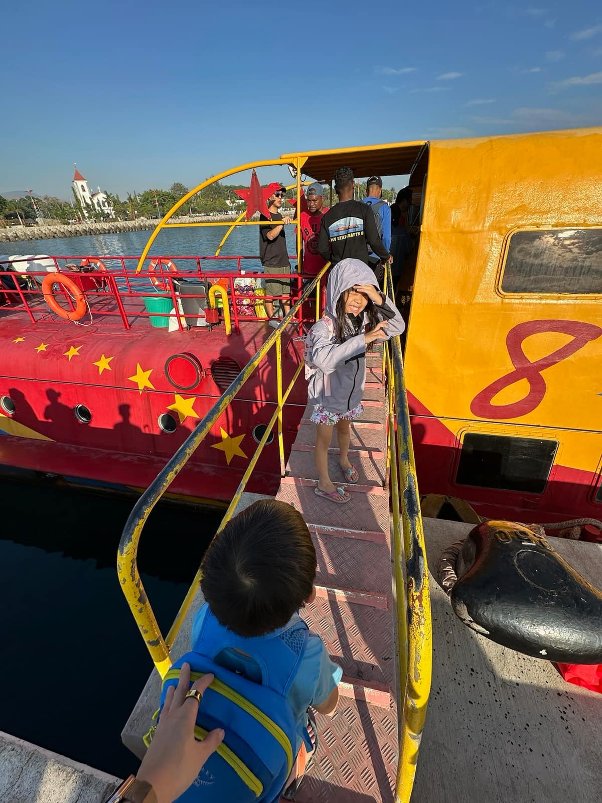 The children boarding the morning boat from Dili to Atauro Island