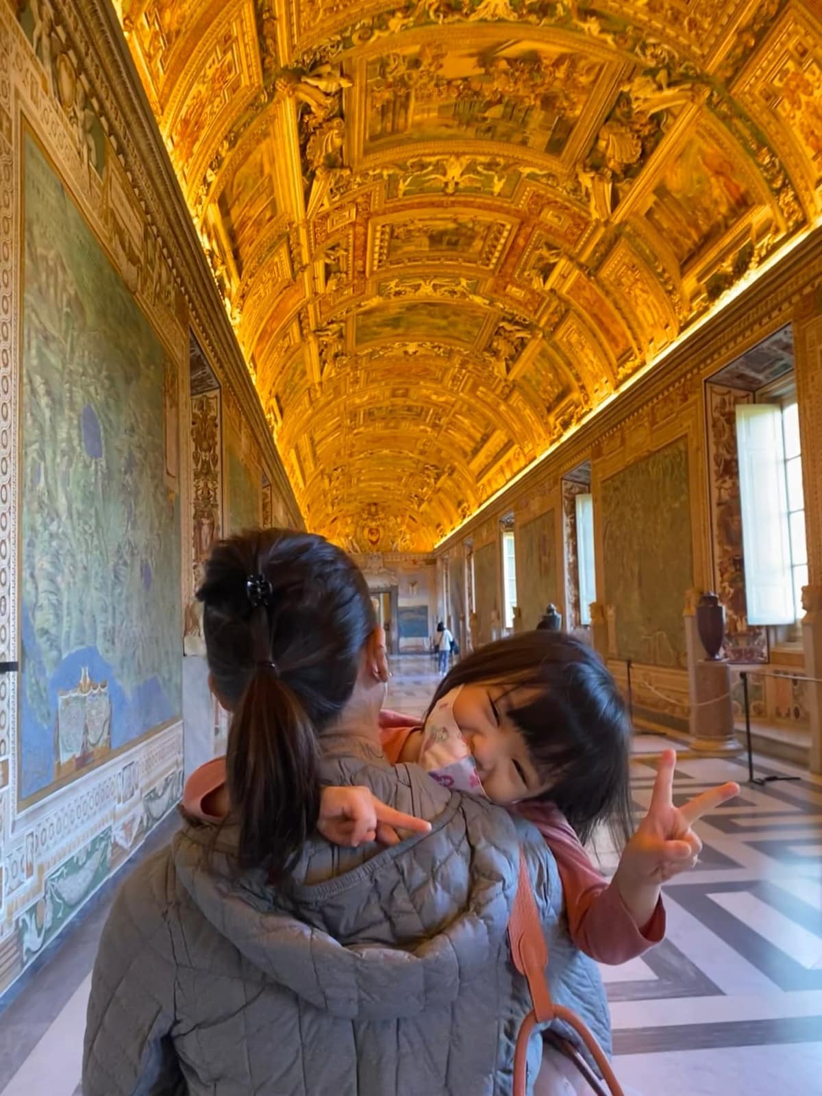 Sophie and George walking out of the Vatican