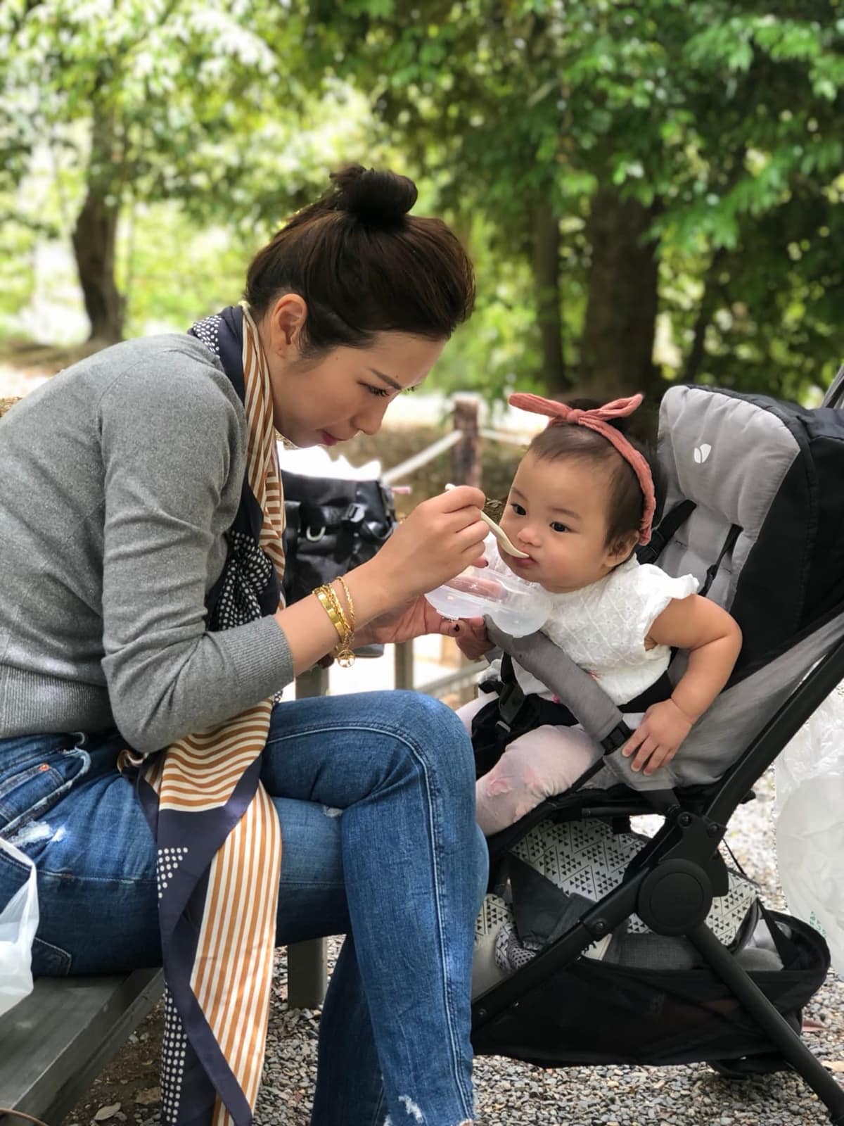 Vanessa feeding Sophie during a pause at Arashiyama