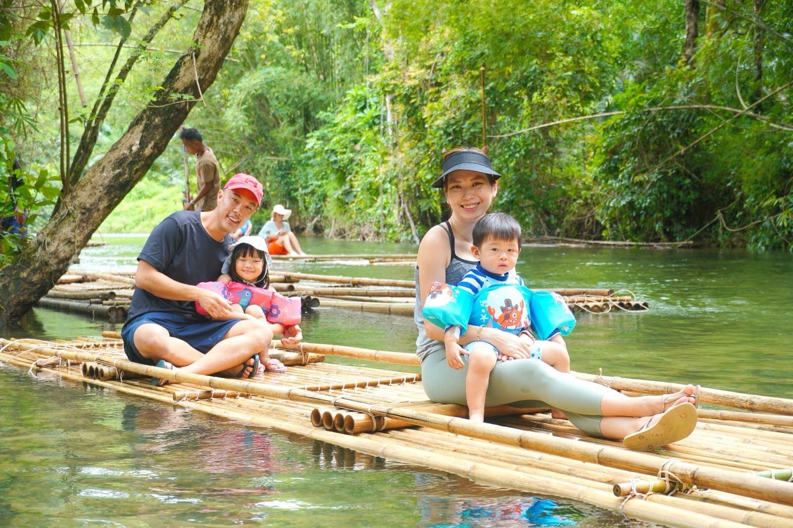 The family bamboo rafting at Khao Sok