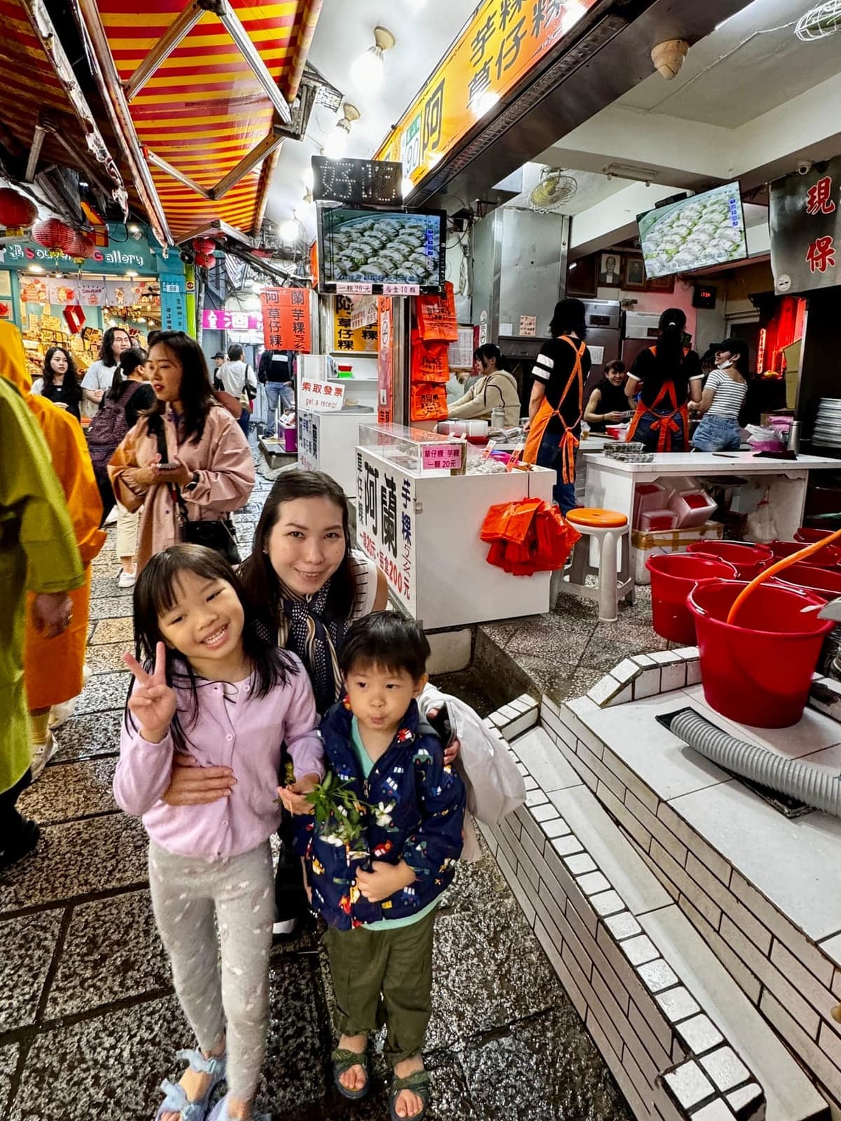 Vanessa and the children walking through Jiufen Old Street