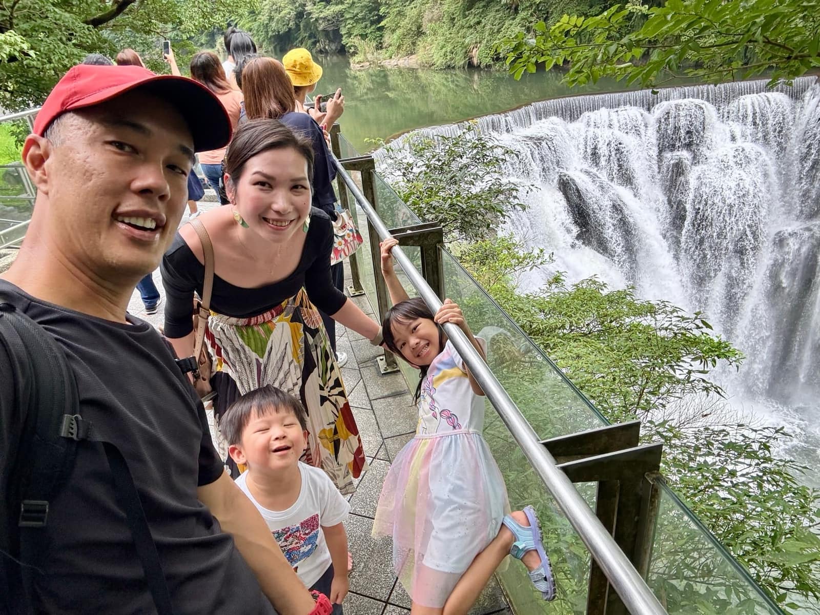 The family together at Shifen Waterfall