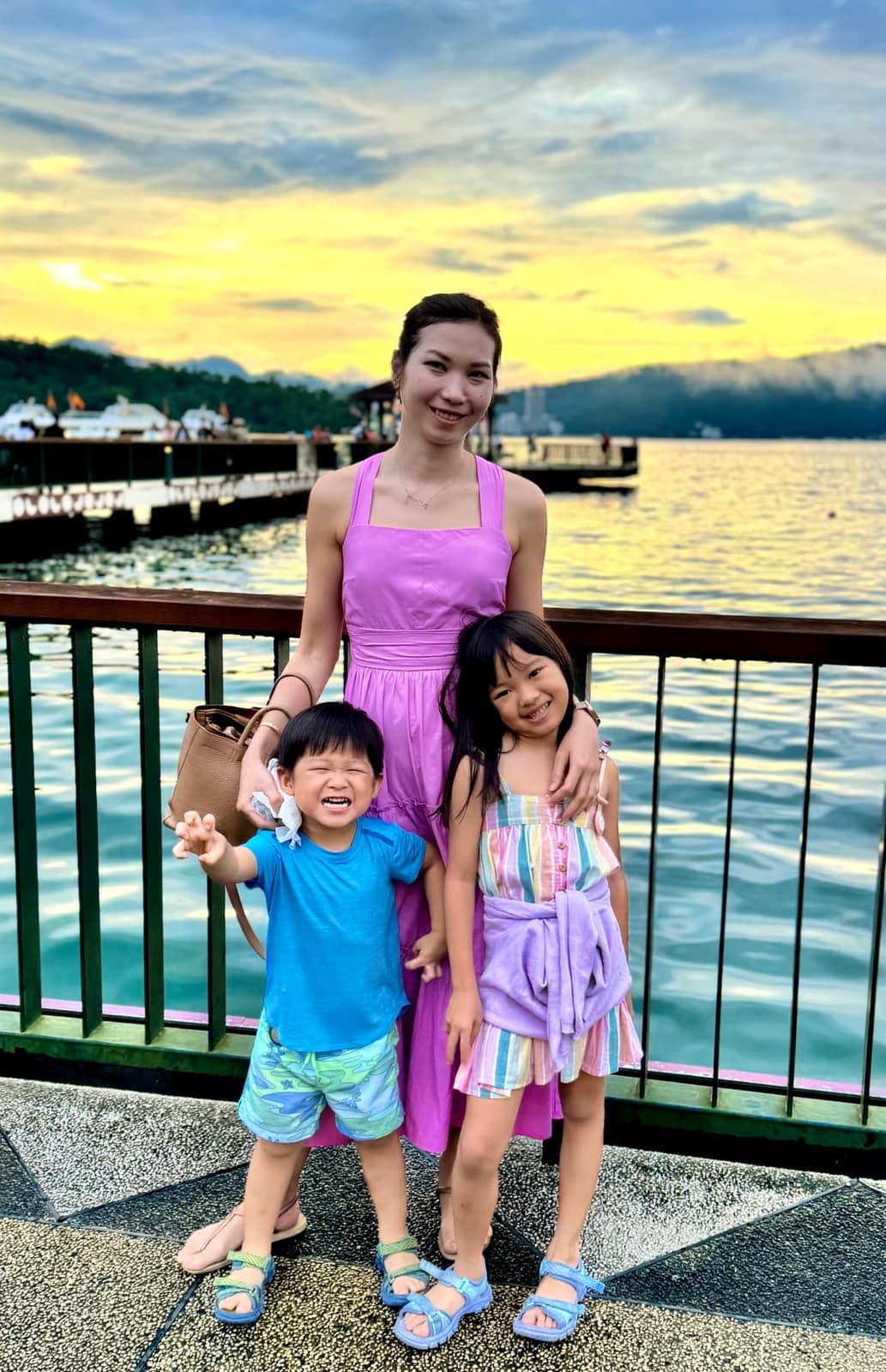 Vanessa and the children by the lake in the evening light